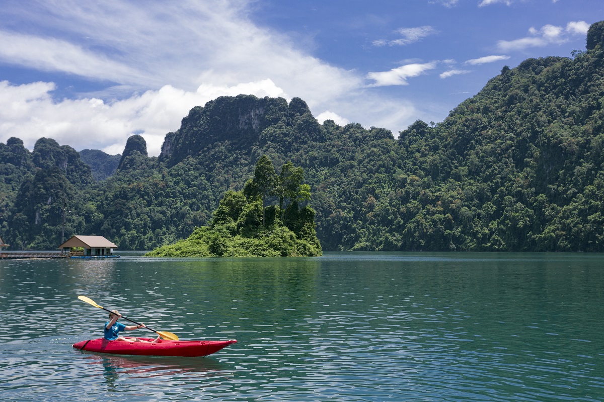 Rowing with a kayak in Kao Sok National Park lake
