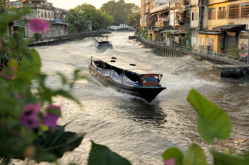 Boat speeding on San Saep canal in Bangkok, Thailand