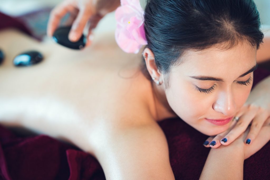 Asian lady relax in skin care aroma therapy and scrub spa