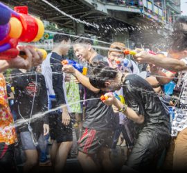 Playful water fight in Thailand during Songkran